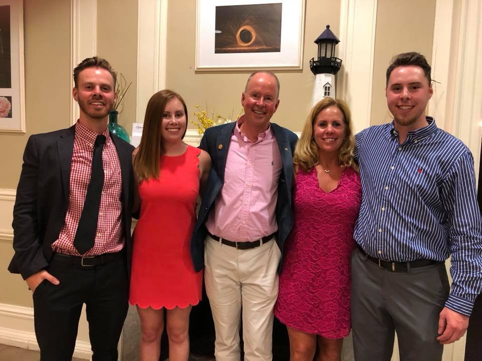 sterling insurance agency family at rotary club event
